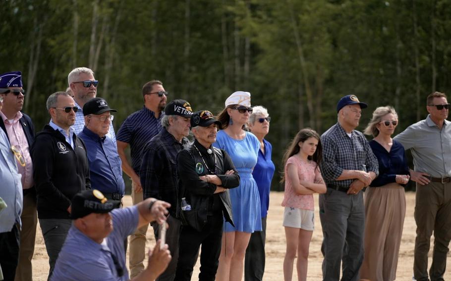 The crowd watches the ceremony.